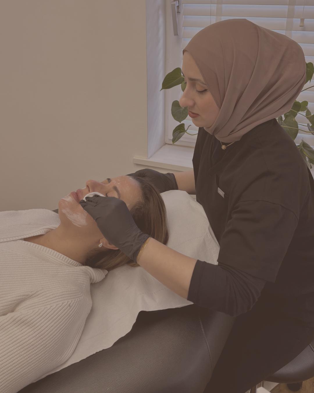 Dr Khan delivering a luxury facial treatment